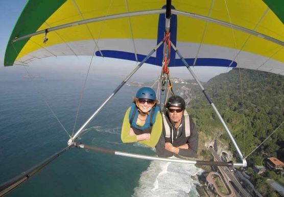Adventures for Solo Travelers - Solo travelers experience tandem hang gliding over the Pacific coastline on an unforgettable small group adventure.