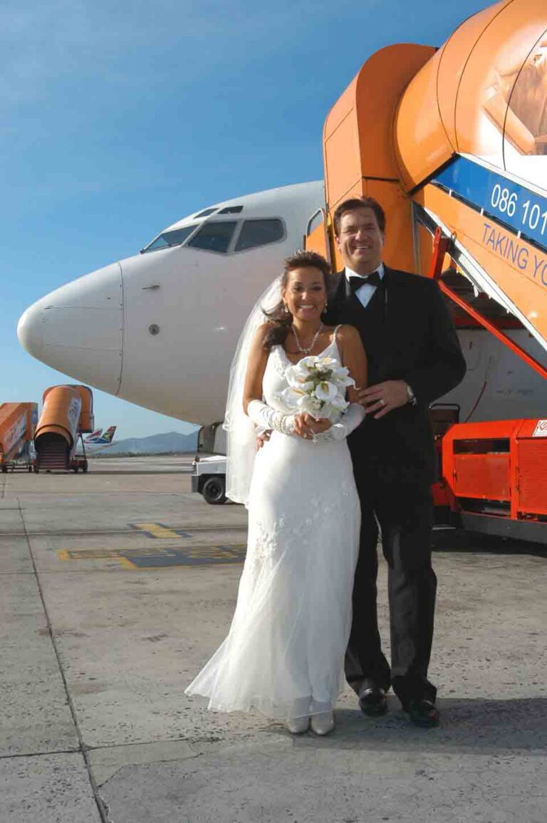 Marriage in the Clouds. Suzy Davis, Founder of Adventures for Solo Travelers, marries Terry Pawelko in the clouds on the flight where they initially met.